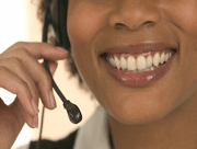 Woman smiling while on a support call